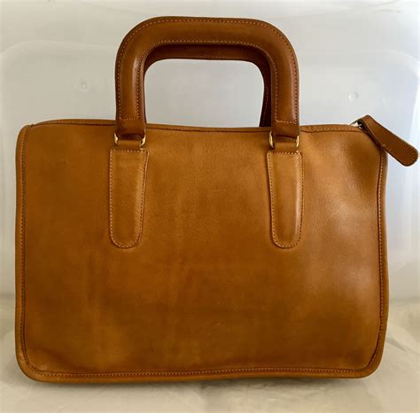 Vintage leather top handle bag, 1970s .